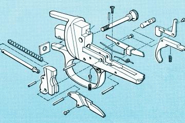 A black and white illustration of a gun being assembled